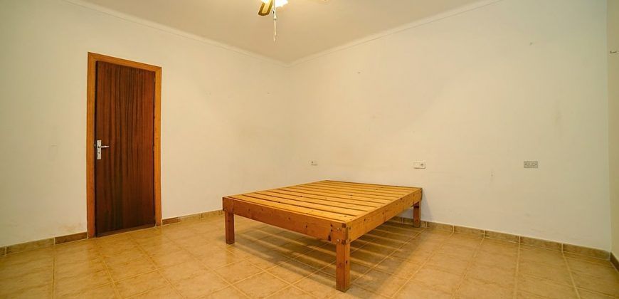 Encantadora casa de pueblo con jardín en alquiler en Es Llombards