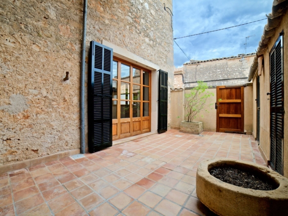Spacious Village House for Rent with Patio in Es Llombards