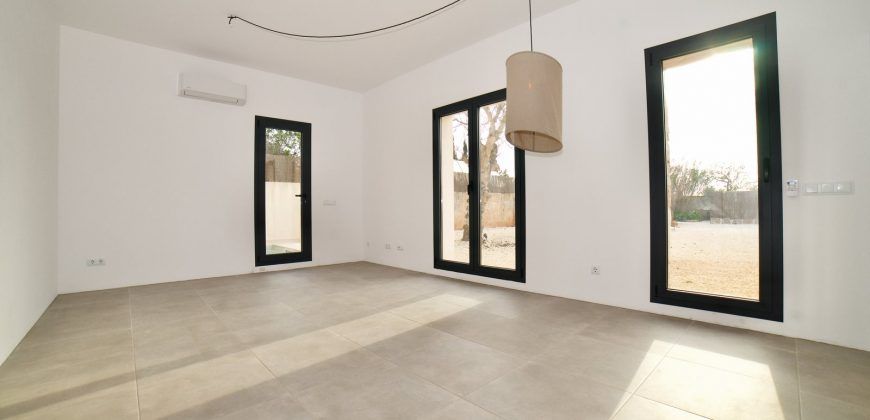 Impecable casa de pueblo reformada con jardín y piscina en Santanyí