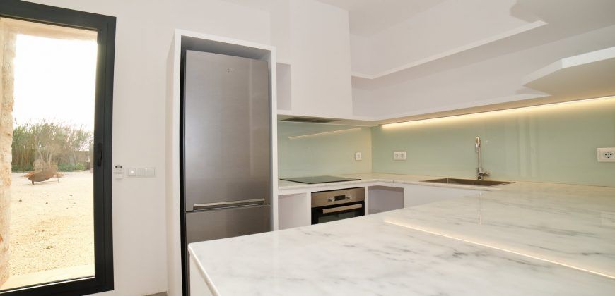 Impecable casa de pueblo reformada con jardín y piscina en Santanyí