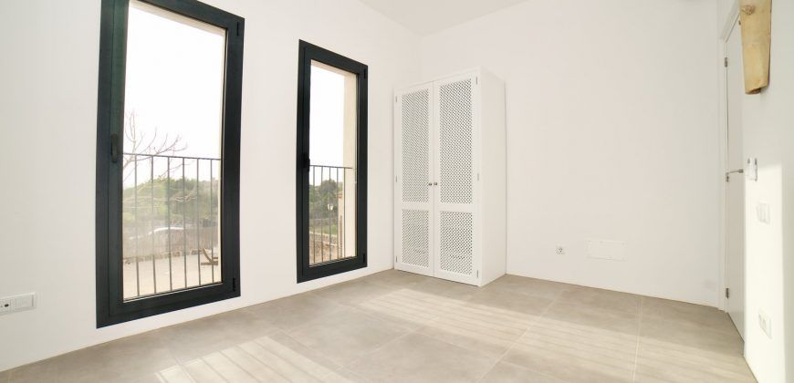 Impecable casa de pueblo reformada con jardín y piscina en Santanyí