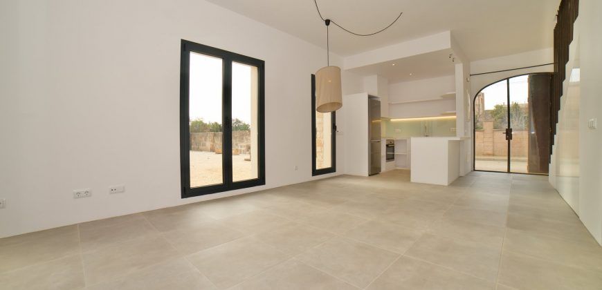 Impecable casa de pueblo reformada con jardín y piscina en Santanyí