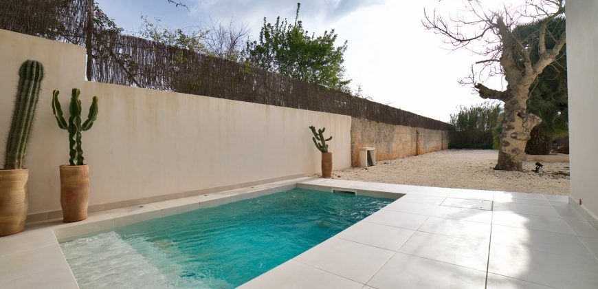 Impecable casa de pueblo reformada con jardín y piscina en Santanyí
