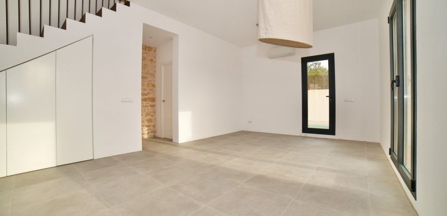 Impecable casa de pueblo reformada con jardín y piscina en Santanyí