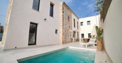 Impecable casa de pueblo reformada con jardín y piscina en Santanyí