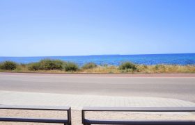 Preciosa planta baja con jardín frente al mar en s’Estanyol