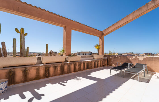Casa de pueblo en venta en Ses Salines con vistas al mar, garaje y placas solares