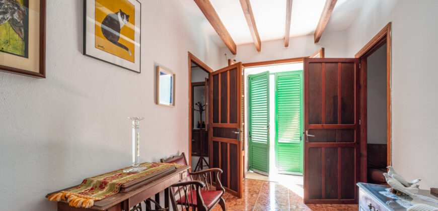 Versatile two-story town house for sale in the heart of Ses Salines