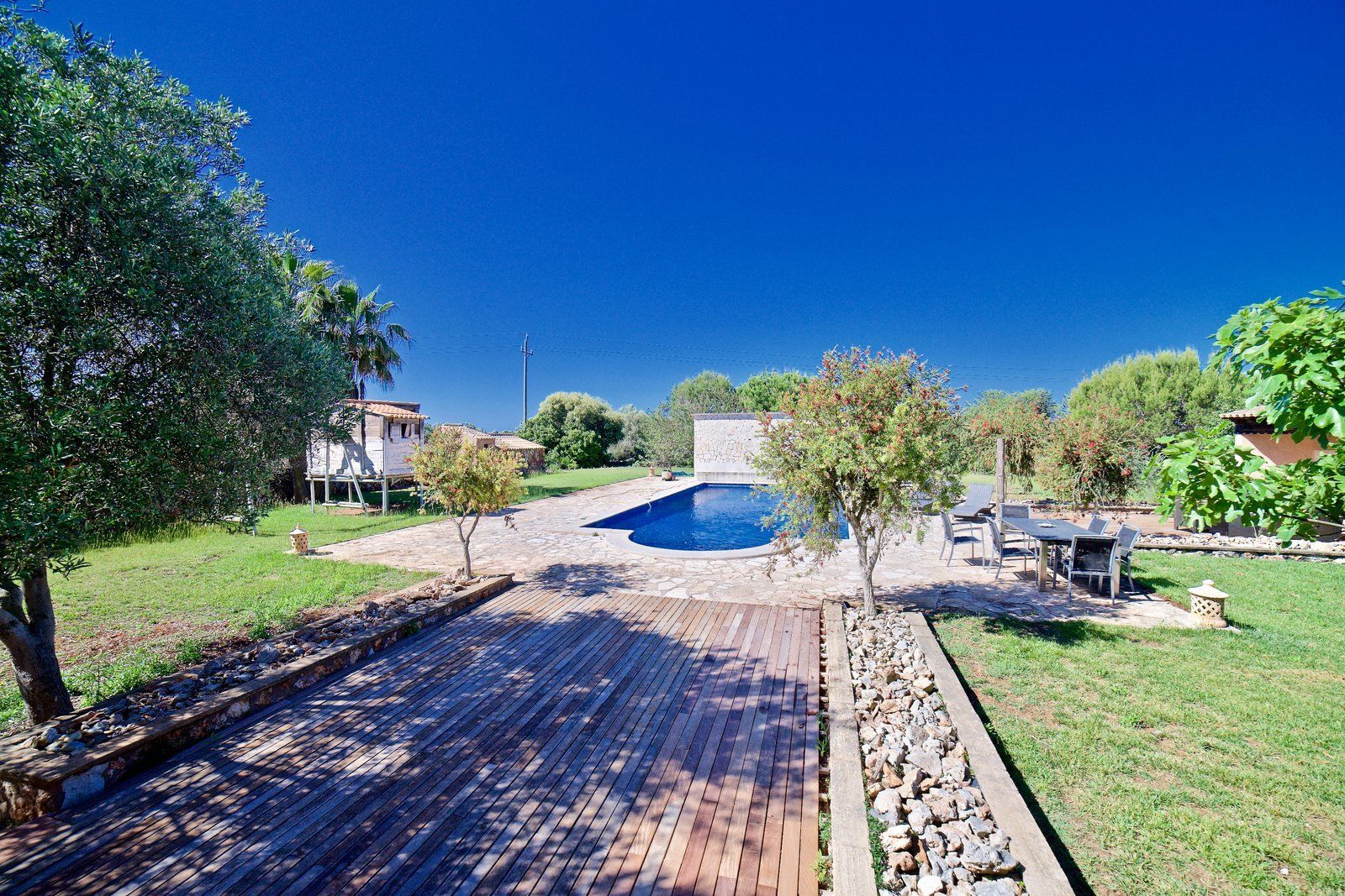 Casa de campo con piscina y vistas al mar en Es Llombards