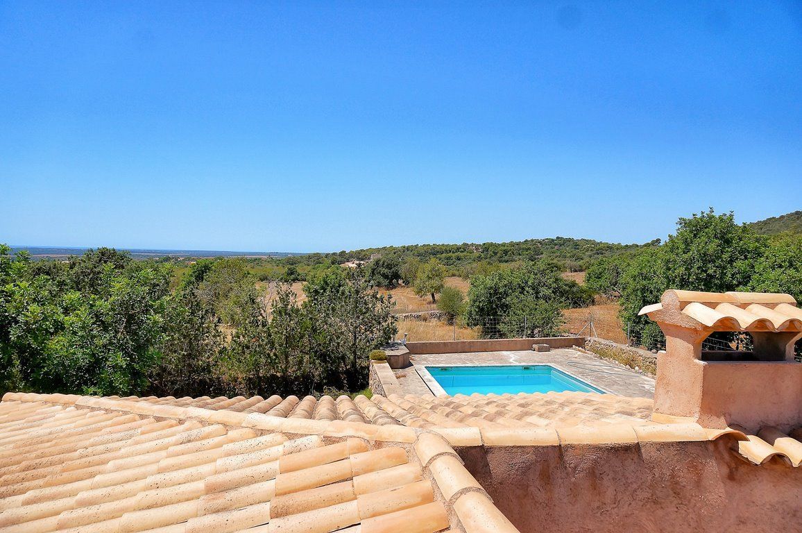Casa de campo con piscina y vistas al mar en Santanyí