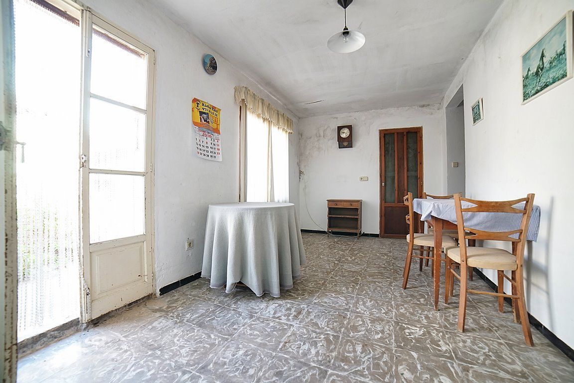 Casa de pueblo en Es Llombards con jardín y gran potencial