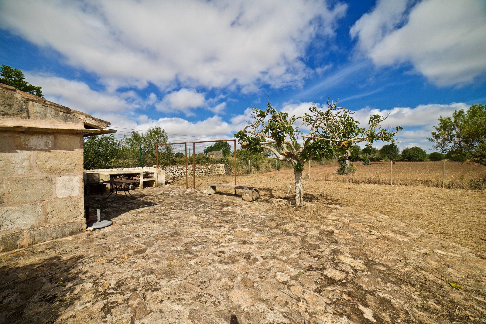 2-909-Villasyfincasmallorca.jpg Country House for Rent in Santanyí – Restored Mill on 15,000 m² Estate