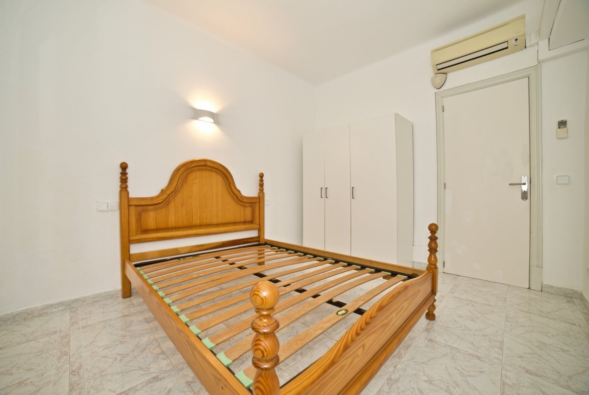 Beachfront Long-Term Rental in Sa Ràpita: 4-Bed Ground Floor Apartment