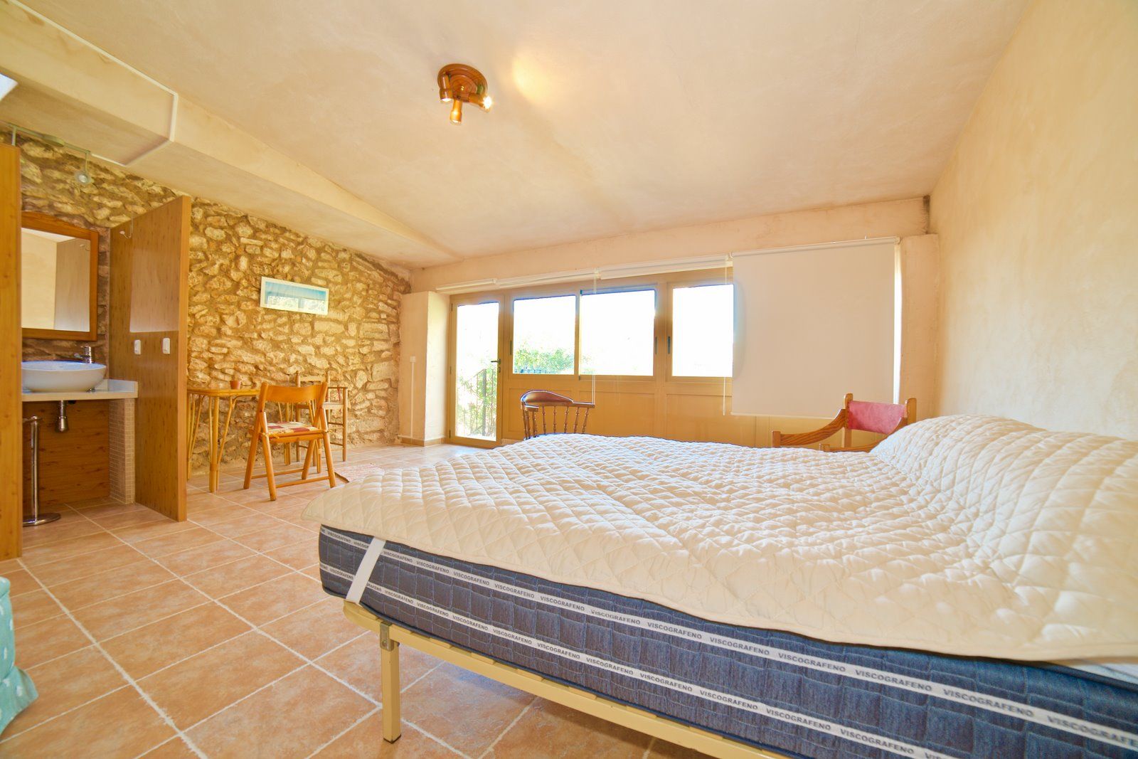21-1180-Villasyfincasmallorca.jpg Charming Village House for Rent in Ses Salines with Garden