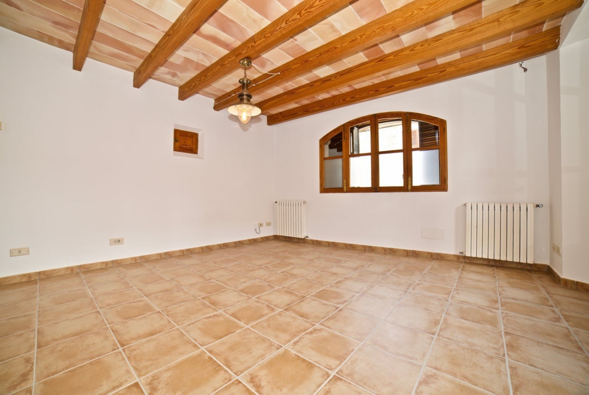 Spacious Village House for Rent with Patio in Es Llombards