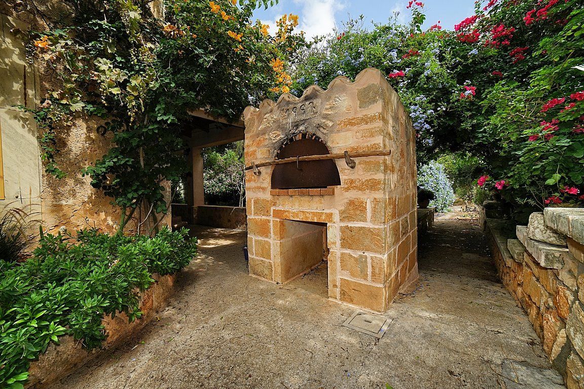 Casa de pueblo con jardín y piscina en alquiler, Es Llombards