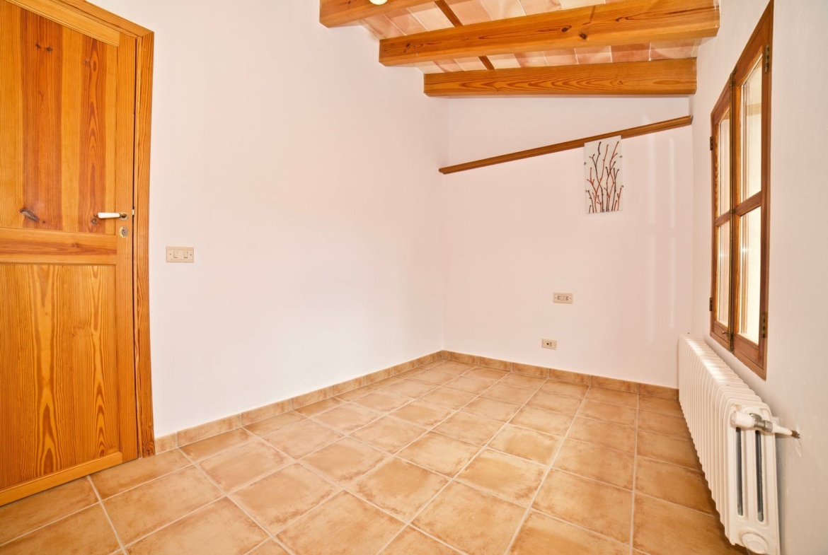 Spacious Village House for Rent with Patio in Es Llombards