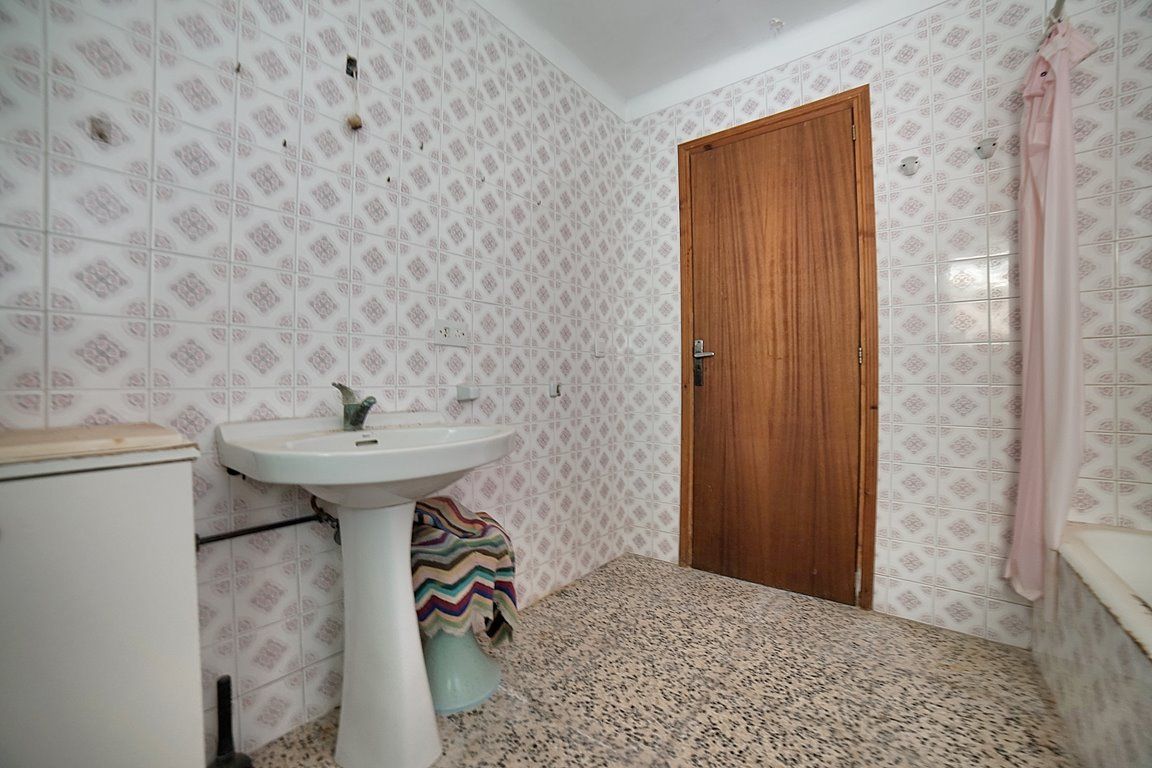 Casa de pueblo en Es Llombards con jardín y gran potencial