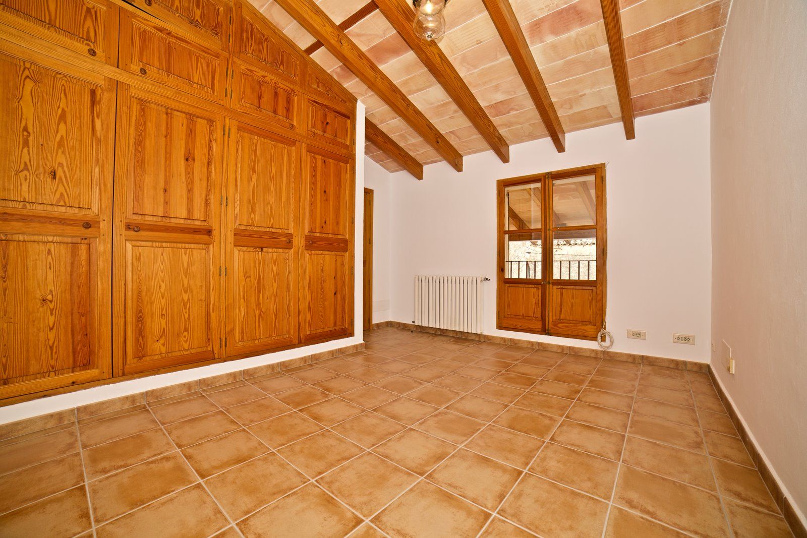 8-1161-Villasyfincasmallorca.jpg Spacious Village House for Rent with Patio in Es Llombards
