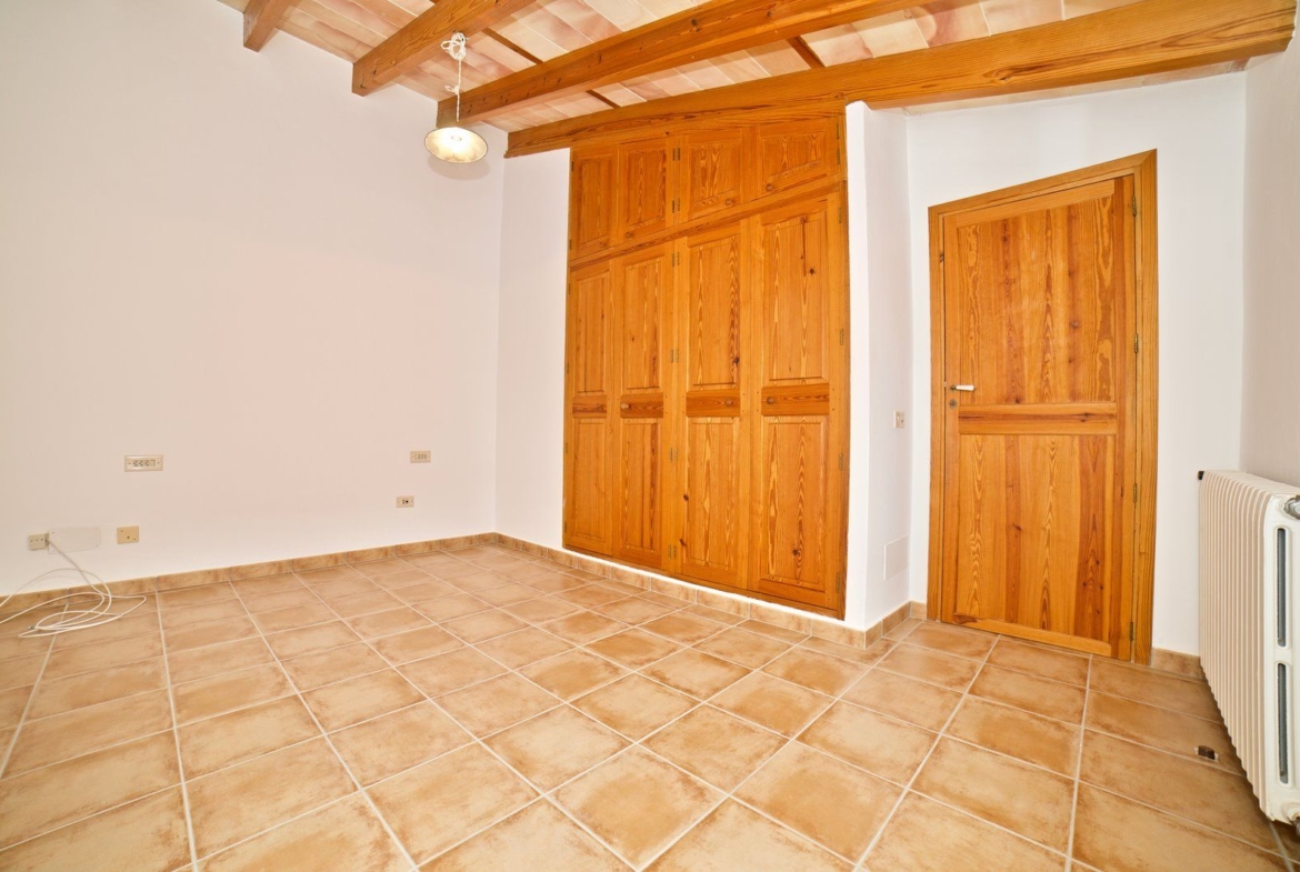 Spacious Village House for Rent with Patio in Es Llombards